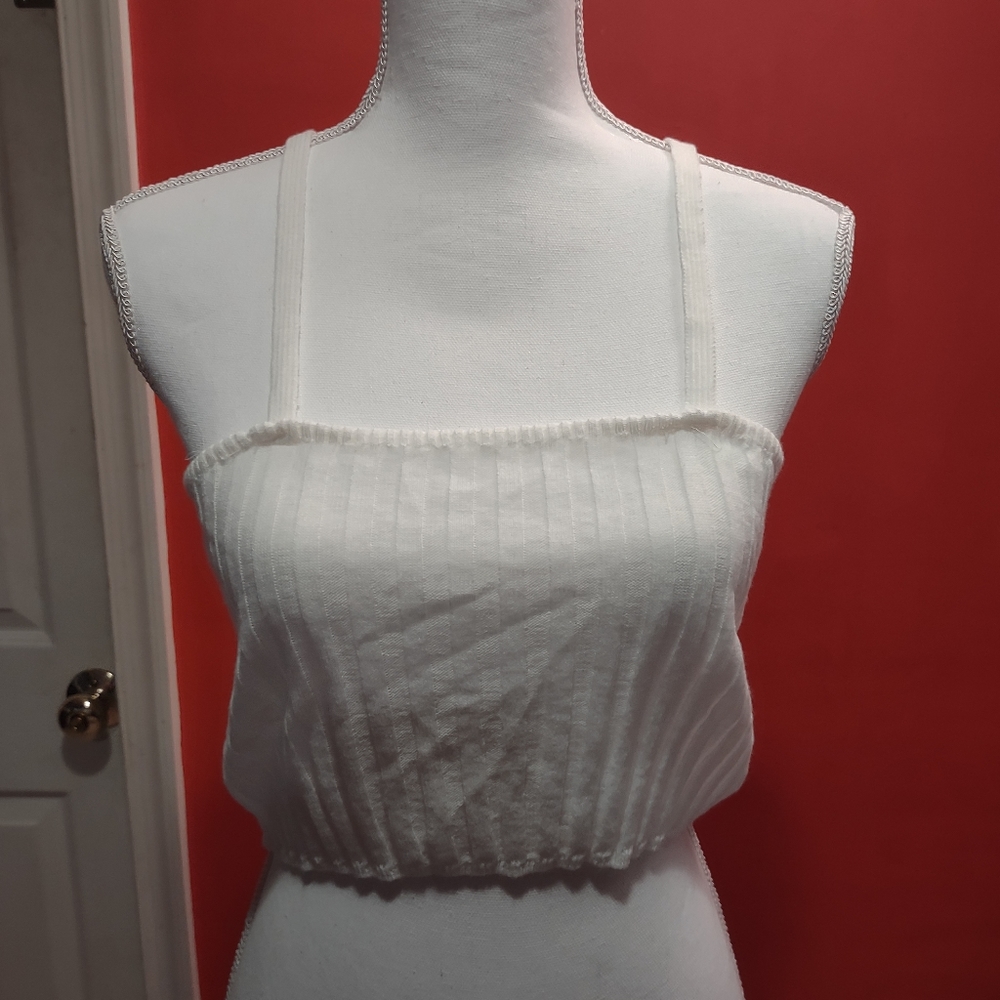 Crop top made by in the style